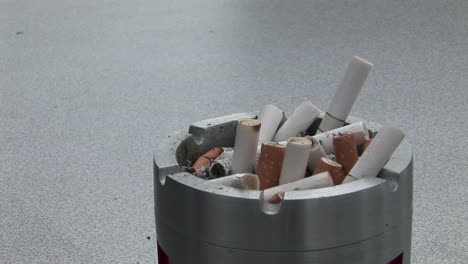 Putting-out-Cigarette-in-Ash-Tray-
